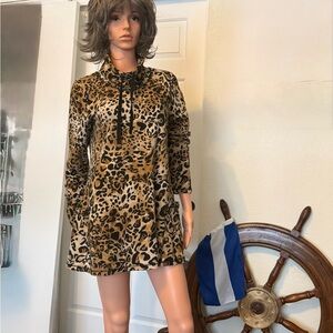 Leopard Print Long Sleeve tunic  or short dress.  Alluring.